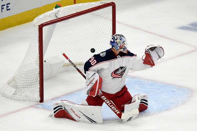 Hockey News - Toews, Lehner Lead Blackhawks Over Blue Jackets 3-2 In OT