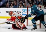 Flames use fast start to beat Sharks 6-2