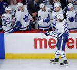 Rielly scores in OT as Maple Leafs beat Blackhawks 7-6