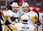 Pittsburgh Penguins showcase firepower in 9-1 romp over Calgary Flames