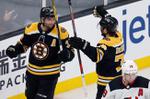 Rask, Bruins blank Devils 3-0 in home opener