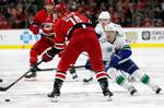 Williams' shootout goal lifts Hurricanes past Canucks, 4-3