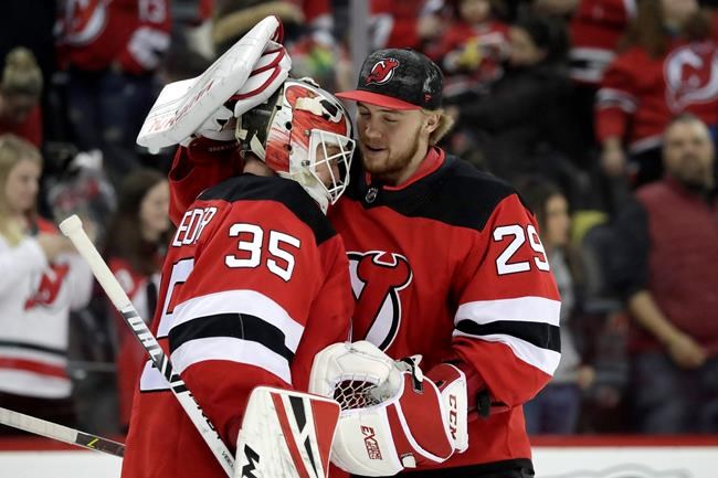 Hockey News - Schneider Makes 45 Saves In Leading Devils Over Sabres 3-1