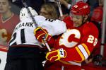 The Latest: Peters will not coach Flames against Sabres