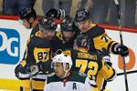 Crosby collects 4 points in return, Penguins rip Wild 7-3